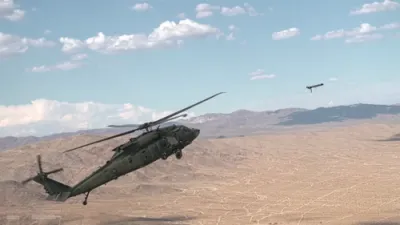 צום ערשטן מאל: א בלעק האק העליקאפטער שיסט ארויס אן אטאמאטישע אטאקע דראון דורכאויס א טעסט אינעם מדבר
