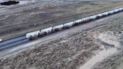 דראון ווידעא צייגט 34 באן וואגאנען איבערגעקערט פון א שווערן שטורעם אין יוטא
