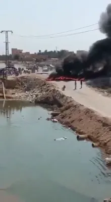 דמשק אונטער דרוק: פראטעסטן איבער ברענשטאף פרייזן האבן אפגעשניטן א וויכטיגע בריק ביים איראקער גרעניץ
