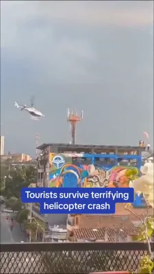 שרעקעדיגע סצענע: א העליקאפטער דרייט זיך ווילד און קראכט אריין אין א געביידע סעקונדעס נאכן זיך הייבן פון א דאך