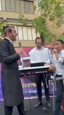 שמחת יום טוב אין שיבא: זינגערס זענען משמח קינדער וואס קעמפן מיט די מחלה ביי א שמחת בית השואבה